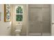 Clean bathroom with a shower, toilet and modern vanity at 0 Hanover Dr, Sanford, NC 27330