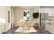 Bright dining room with a table and six chairs, adjacent to the kitchen at 0 Hanover Dr, Sanford, NC 27330