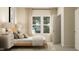 Bedroom with light wood bed frame, neutral decor and large window at 0 Hanover Dr, Sanford, NC 27330