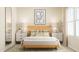 Bright bedroom with a light wood bed frame and neutral decor at 0 Hanover Dr, Sanford, NC 27330