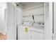 Neat laundry closet with washer and dryer included at 1321 Dylan Heath Ct, Raleigh, NC 27608