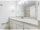 Clean bathroom with granite countertop vanity and updated lighting at 1321 Dylan Heath Ct, Raleigh, NC 27608