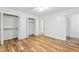 Bright bedroom with wood-like floors and built in closet at 1321 Dylan Heath Ct, Raleigh, NC 27608