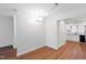 Spacious dining area with wood floors and chandelier at 1321 Dylan Heath Ct, Raleigh, NC 27608