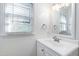 Bright bathroom with white vanity and updated fixtures at 1321 Dylan Heath Ct, Raleigh, NC 27608