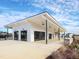 Modern community cabana with large glass garage doors at 1073 Channel Drop Lp, Zebulon, NC 27597