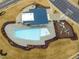 Community pool and cabana with playground nearby at 1073 Channel Drop Lp, Zebulon, NC 27597