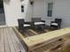 Relaxing deck with seating area, perfect for outdoor entertaining at 509 E Church St, Nashville, NC 27856