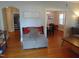 Living room with view into dining room and hardwood floors at 509 E Church St, Nashville, NC 27856