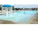 Relaxing community pool with a fun mushroom fountain at 687 Leland Hl Cir, Zebulon, NC 27597