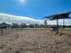 Community dog park with shaded seating at 687 Leland Hl Cir, Zebulon, NC 27597