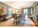 Elegant dining room with hardwood floors and chandelier at 205 N Boundary St, Chapel Hill, NC 27514