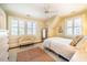 Bedroom with window seat and ceiling fan at 205 N Boundary St, Chapel Hill, NC 27514