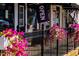 Quaint shop exterior with vibrant flowers and an open sign at 160 Blue Butterfly Dr, Angier, NC 27501