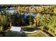 Aerial view of community lake, walking paths, and pavilion at 160 Blue Butterfly Dr, Angier, NC 27501