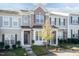 Beige townhome exterior with brick accents at 2808 Corbett Grove Dr, Raleigh, NC 27616