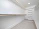 Spacious walk-in closet with ample shelving and hanging space at 1223 Chaney Rd, Raleigh, NC 27606