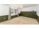 Bright bedroom with green wainscoting and ceiling fan at 552 Stobhill Ln, Holly Springs, NC 27540