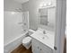 Clean bathroom with a tub, shower, and vanity at 615 Wildaro Ct, Hillsborough, NC 27278