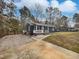 House exterior featuring a gray exterior and a front porch at 615 Wildaro Ct, Hillsborough, NC 27278