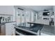 Open concept kitchen with view into living room and fireplace at 1012 Maple Ridge Ct, Burlington, NC 27217