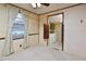 Bedroom with access to the laundry room at 124 Jack Bennett Rd, Chapel Hill, NC 27517