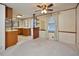 Open dining area with view into kitchen and wood cabinetry at 124 Jack Bennett Rd, Chapel Hill, NC 27517