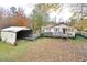 View of a house with a detached workshop and ramp at 124 Jack Bennett Rd, Chapel Hill, NC 27517