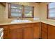 Double sink and wood cabinets in retro kitchen at 124 Jack Bennett Rd, Chapel Hill, NC 27517
