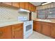 White stove and built in oven in retro kitchen at 124 Jack Bennett Rd, Chapel Hill, NC 27517