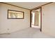 Living area with window looking into another room at 124 Jack Bennett Rd, Chapel Hill, NC 27517