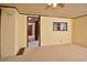 Spacious living room with carpeted floors and ceiling fan at 124 Jack Bennett Rd, Chapel Hill, NC 27517