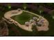 Community gathering space with picnic tables and fire pit at 2165 Pink Peony Cir # 230, Durham, NC 27703