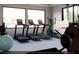Modern fitness center with treadmills and elliptical machines at 2165 Pink Peony Cir # 230, Durham, NC 27703