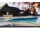 Resort-style pool with lounge chairs, cabanas and nearby clubhouse at 2165 Pink Peony Cir # 230, Durham, NC 27703