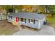 Updated gray house with new roof and small backyard at 509 Keith St, Knightdale, NC 27545