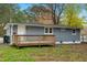 Gray house with wooden deck and storage shed at 509 Keith St, Knightdale, NC 27545