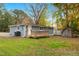 Gray house with wooden deck and storage shed at 509 Keith St, Knightdale, NC 27545