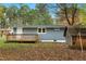 Gray house with wooden deck and storage shed at 509 Keith St, Knightdale, NC 27545