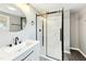 Modern bathroom with a frameless shower and updated fixtures at 509 Keith St, Knightdale, NC 27545