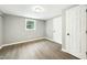 Well-lit bedroom with hardwood floors and neutral wall colors at 509 Keith St, Knightdale, NC 27545