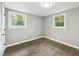 Charming bedroom with two windows and hardwood floors at 509 Keith St, Knightdale, NC 27545