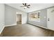 Living area with gray walls, wood-look floors, and lots of natural light at 509 Keith St, Knightdale, NC 27545