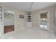 Bright eat-in kitchen with white cabinets, and access to backyard patio at 200 Trails End Ct, Raleigh, NC 27614