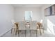 Modern dining room with a wooden table and neutral decor at 310 Leven Dr, Gibsonville, NC 27249