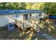 Elevated wooden deck with stairs, providing outdoor space at 336 N Raleigh Farms Rd, Youngsville, NC 27596