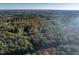 Aerial view of wooded lot ready for new construction at 336 N Raleigh Farms Rd, Youngsville, NC 27596