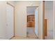 Hallway with doors leading to bedrooms at 336 N Raleigh Farms Rd, Youngsville, NC 27596