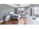 Bright bedroom featuring a queen-size bed and built-in desk at 820 Boone Ridge Ln, Cary, NC 27519