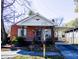 Brick home with a covered porch and carport at 823 E Holly St, Rocky Mount, NC 27801